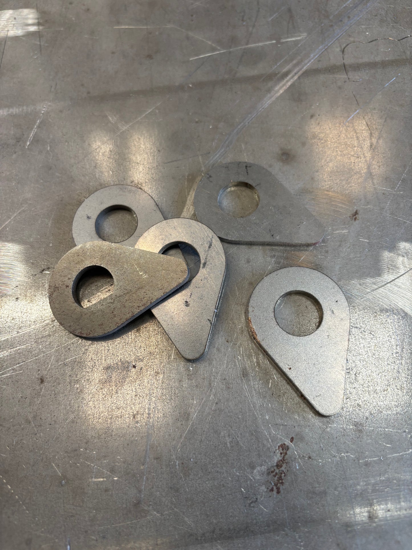 Teardrop weld washer